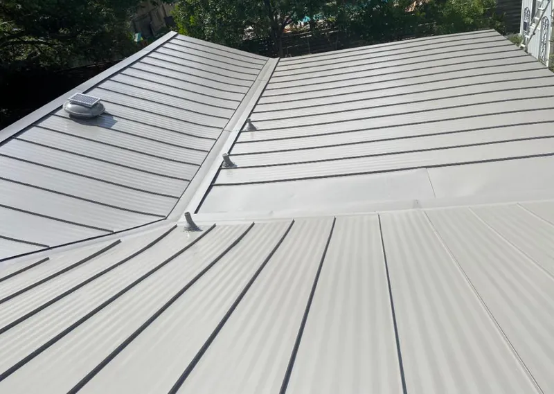 Solar attic fan installed on a metal roof for Roof Ventilation in Scotts Valley